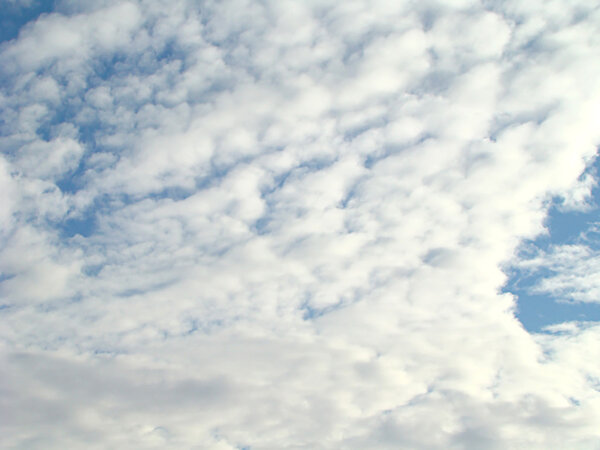 The blue sky in clouds. Photo