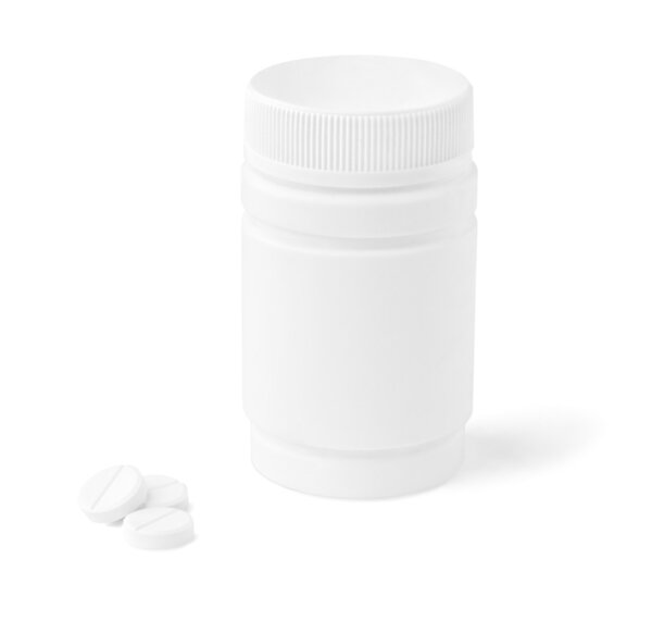 Blank medicine bottle and tablets