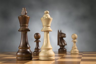 Wooden chess game pieces clipart