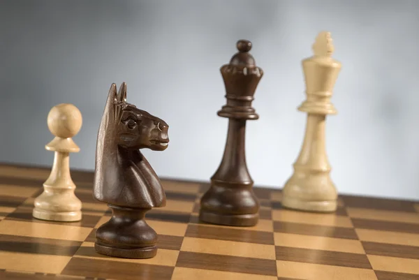 Wooden chess game pieces — Stock Photo, Image