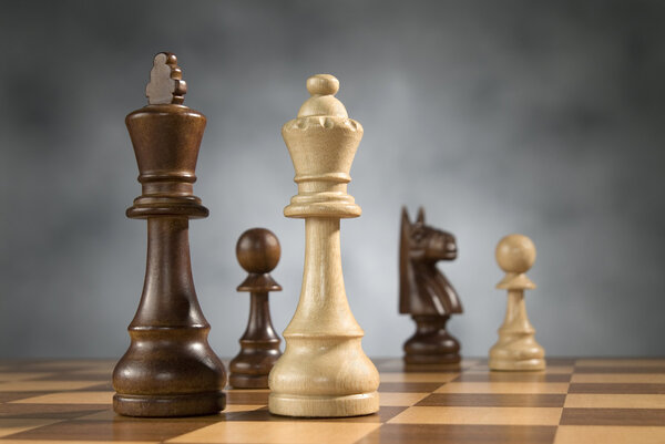 Wooden chess game pieces