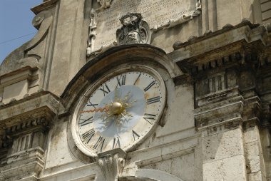 Ornate clock, Spoleto, Italy clipart