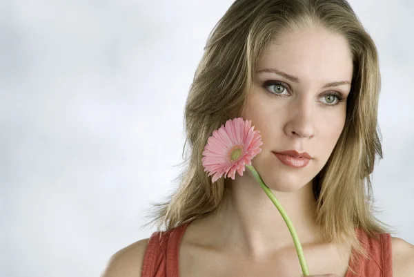 Young woman with flower — Stock Photo, Image