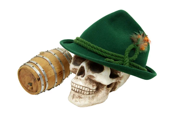 Alpine hat on skull oak barrel — Stock Photo, Image
