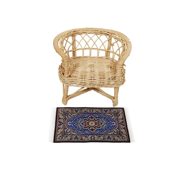 Wicker chair and rug — Stock Photo, Image