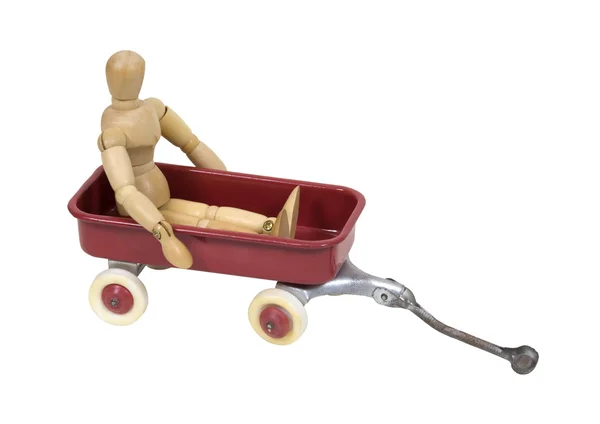Criança em uma carroça de brinquedo — Fotografia de Stock