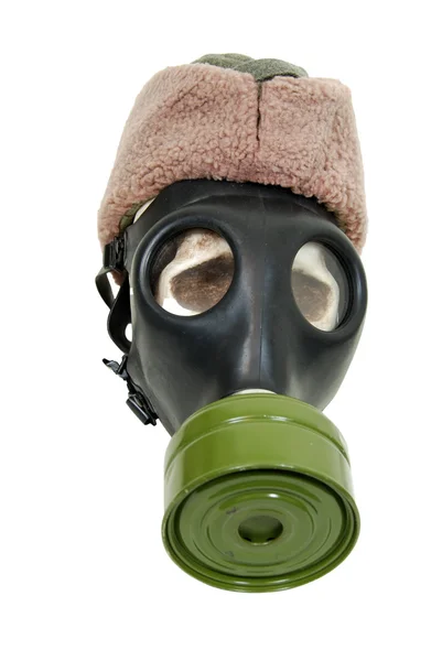 Gasmask och militär mössa — Stockfoto