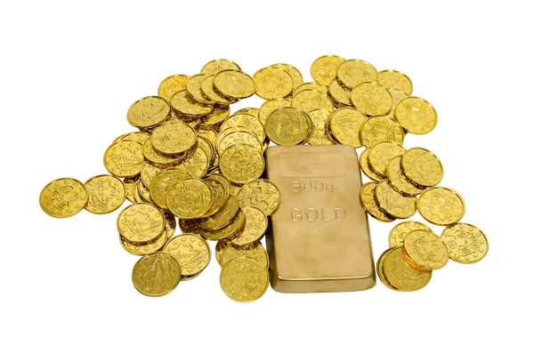 Gouden munten en bar — Stockfoto