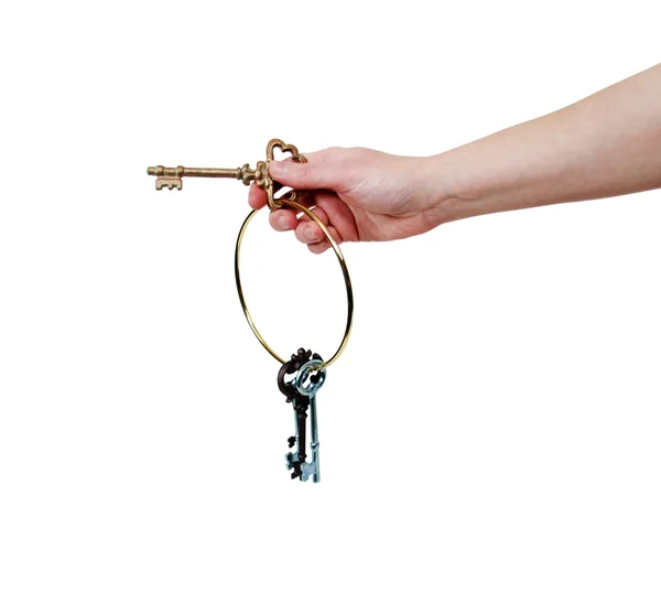 Holding the antique keys — Stock Photo, Image