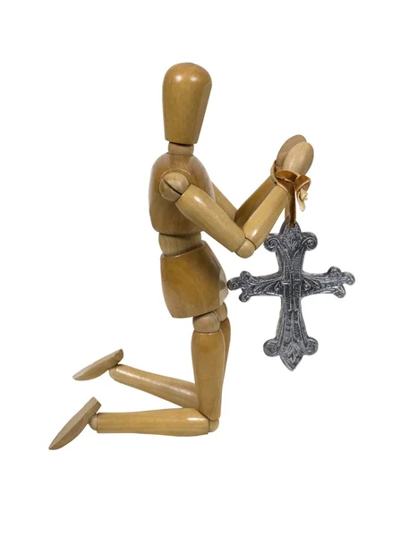 Kniend und betend mit silbernem Kreuz — Stockfoto