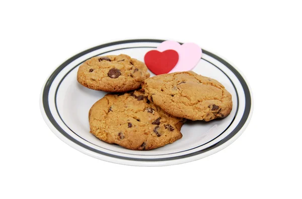 Plate of love and chocolate chip cookies — Stock Photo, Image