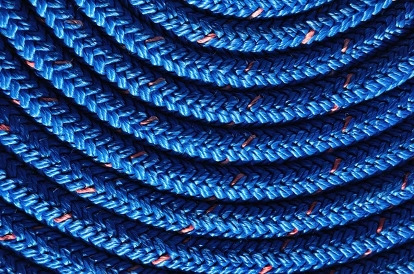 Nahaufnahme von aufgerolltem blauem Seil — Stockfoto