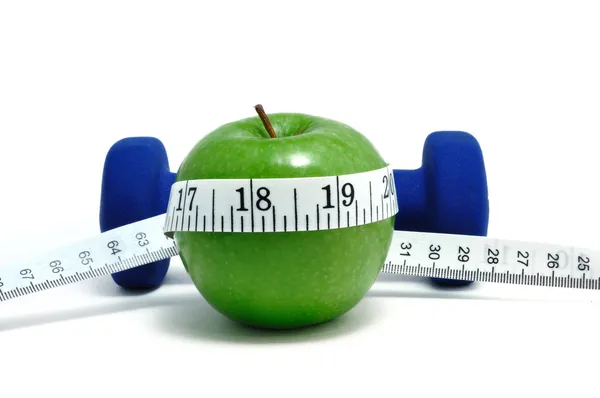 Gewichte, grüner Apfel & Maßband — Stockfoto