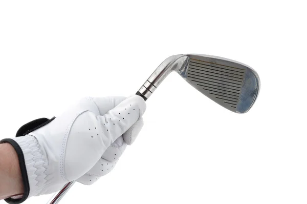 Golfspelare håller ett strykjärn — Stockfoto