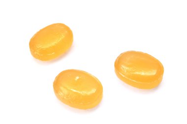 Three Yellow Cough Drops clipart