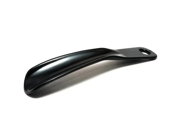 Schwarzes Schuhhorn aus Kunststoff — Stockfoto