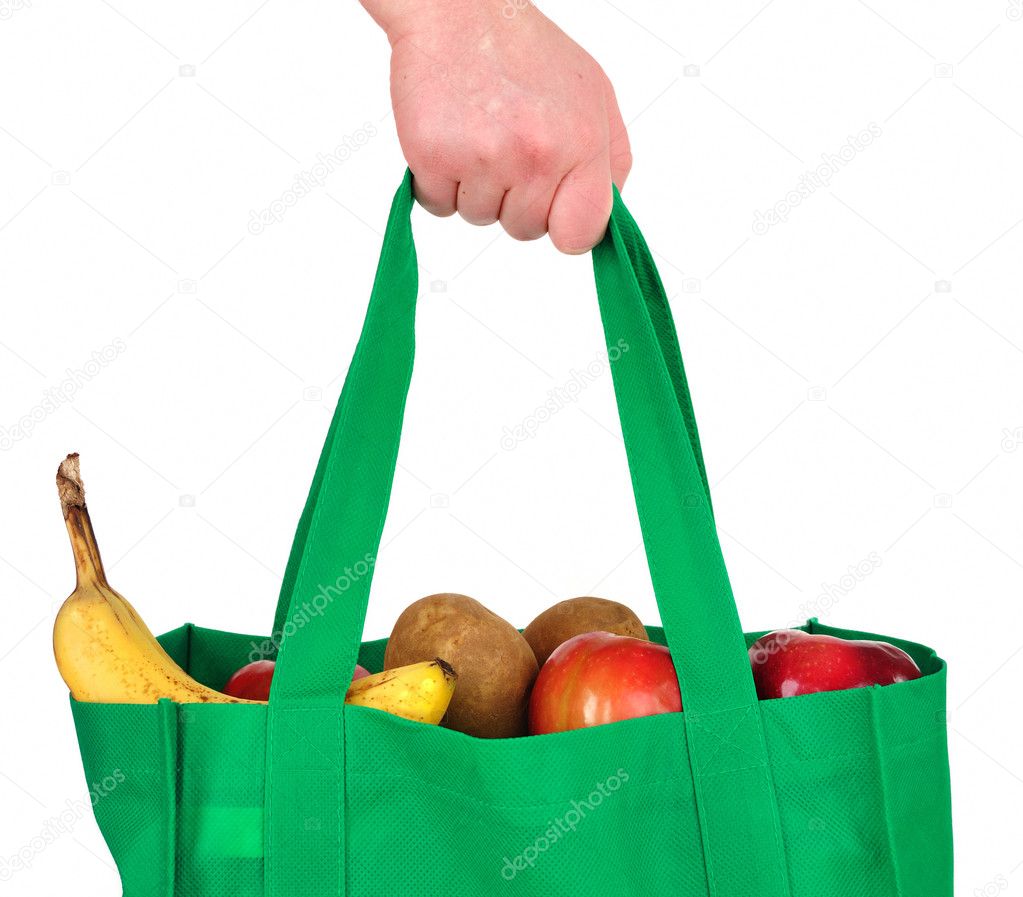 Carrying Groceries in Reusable Green Bag