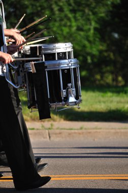 Drummers Playing Snare Drums in Parade clipart