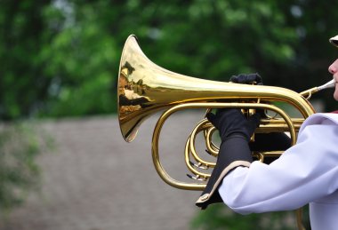 Performer Playing Mellophone in Parade clipart