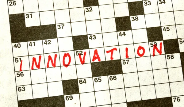 A word az innováció a keresztrejtvény — Stock Fotó