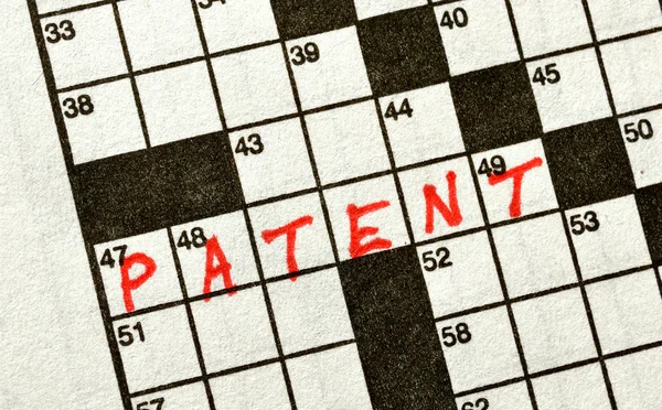 The Word PATENT on Crossword Puzzle — ストック写真