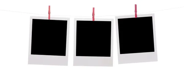 Polaroidfotos hängen am Seil — Stockfoto