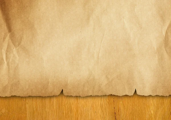 Vintage paper on wood — Stock Photo, Image