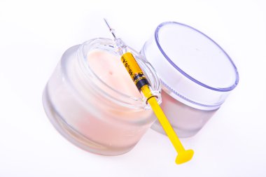 Botox cream with syringe clipart