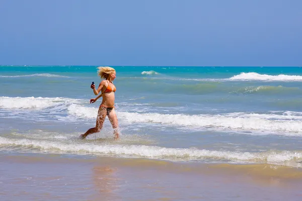 Stock image Woman on the beach