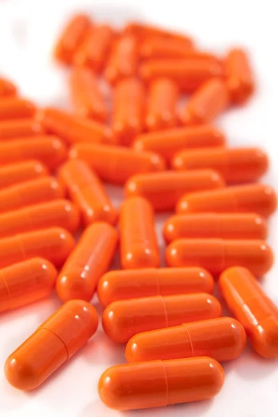 Bunch of orange pills — Stock Photo, Image