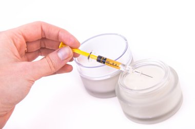 Botox cream with syringe clipart