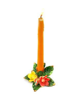 Burning candle in candlestick clipart