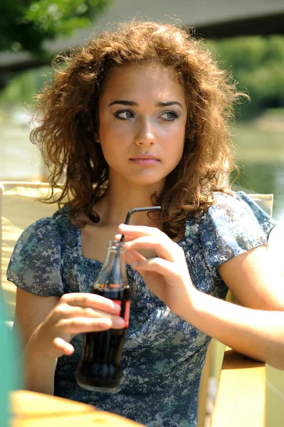 Beautiful girl with soda — Stock Photo, Image