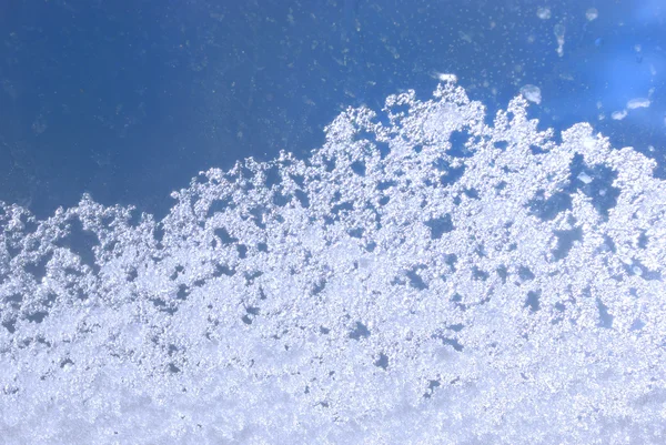 Stock image Snow lying on a window