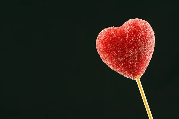 Röda hjärtformade lollipop — Stockfoto