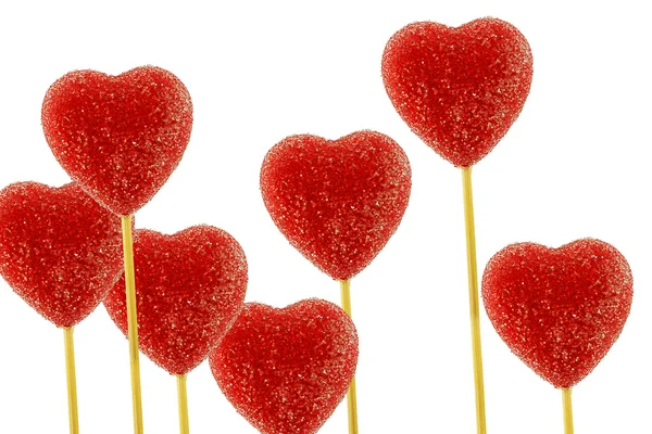 Stock image Multiple red heart-shaped lollipops