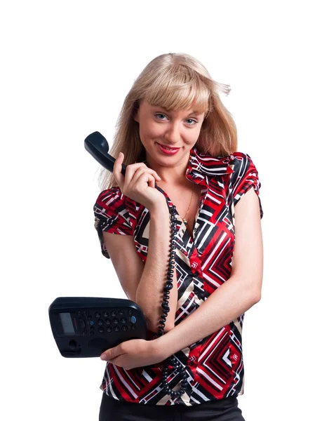 Jeune femme caucasienne avec téléphone de bureau — Photo