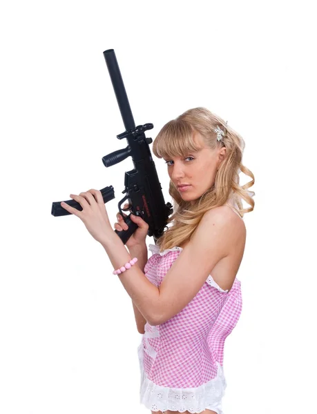 Young sexy woman with an assault gun — Stock Photo, Image