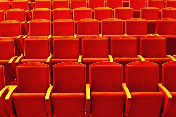 stock image Empty rows of red theatre seats