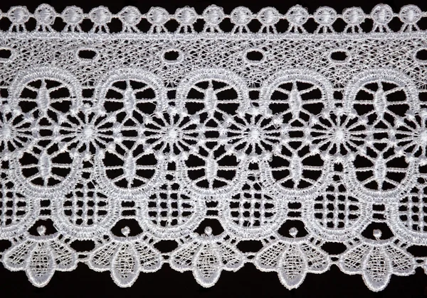 stock image White lace over black background