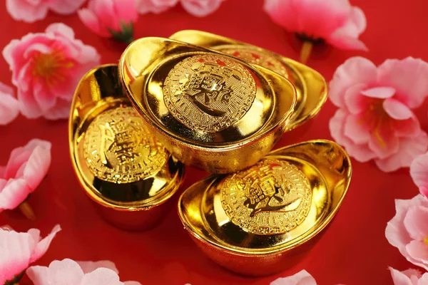 Traditional chinese gold ingots Stock Photo