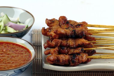 A plate of Chicken Satay clipart