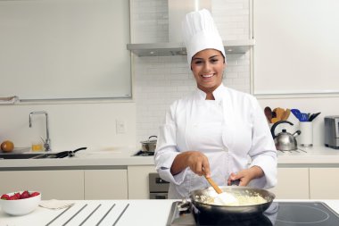 Chef cooking a tasty risotto clipart