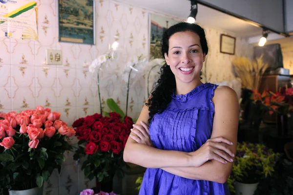 Happy owner of a flower shop — Stock Photo, Image