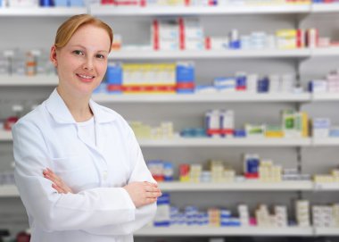 Female pharmacist at pharmacy clipart