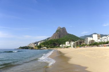 View of Leblon beach with Two Brothers clipart