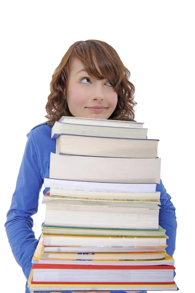 stock image Student carrying stack of books