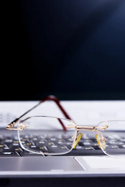 stock image Glasses lay on the keyboard