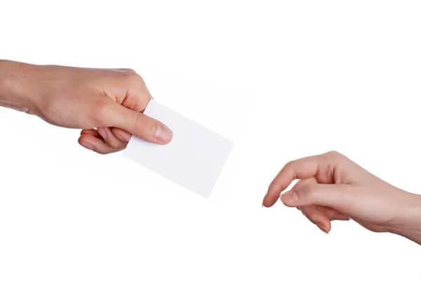 Ręką człowieka daje karta kobieta dłoni — Zdjęcie stockowe