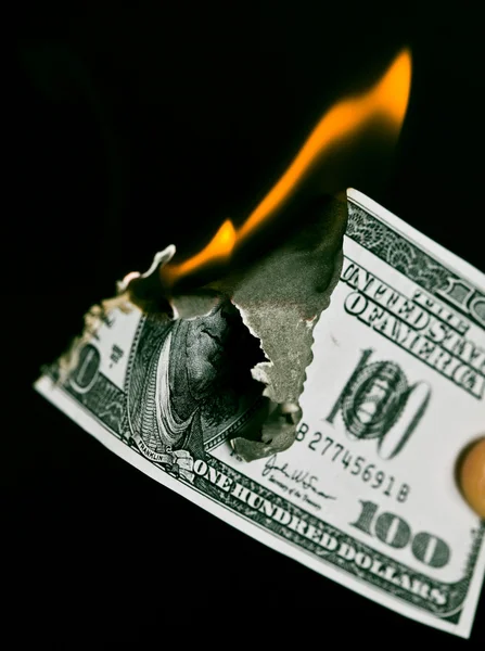 stock image Burning one hudred dollars